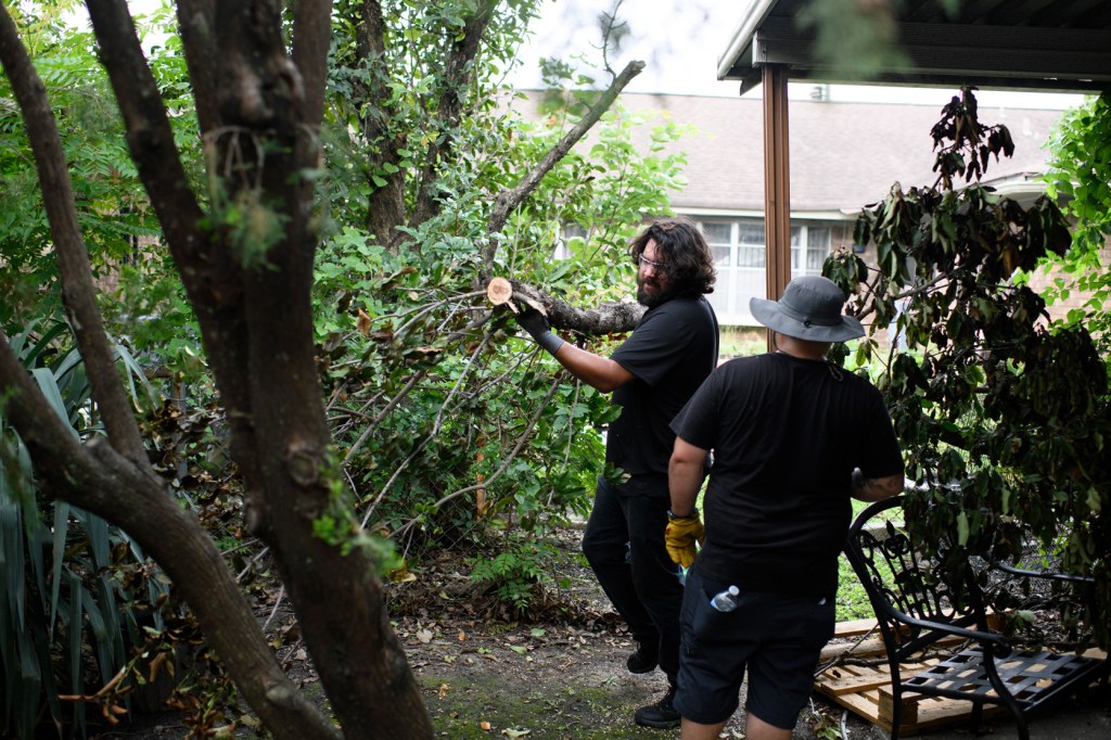 Volunteers unite to clean up toppled trees after Houston storm