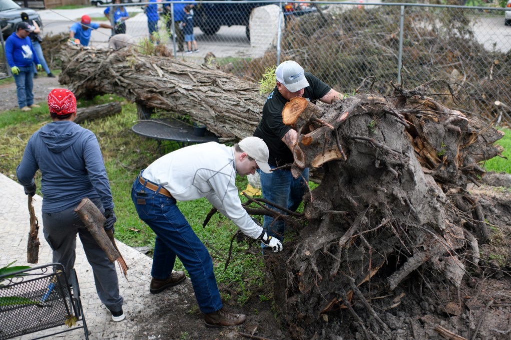 Volunteers unite to clean up toppled trees after Houston storm